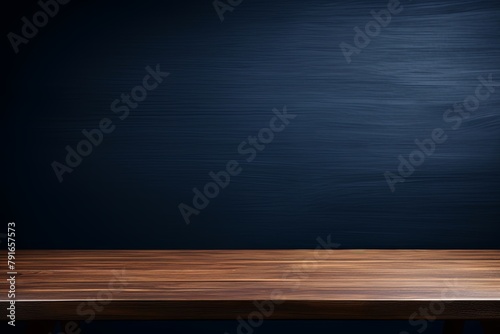 Abstract background with a dark blue wall and wooden table top for product presentation, wood floor, minimal concept, low key studio shot