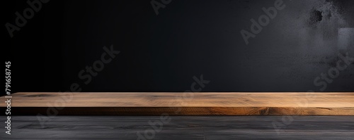 Abstract background with a dark gray wall and wooden table top for product presentation, wood floor, minimal concept, low key studio shot