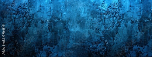 Abstract blue grunge background texture with dark smudges and stains photo