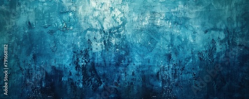 Abstract blue grunge background texture with dark smudges and stains