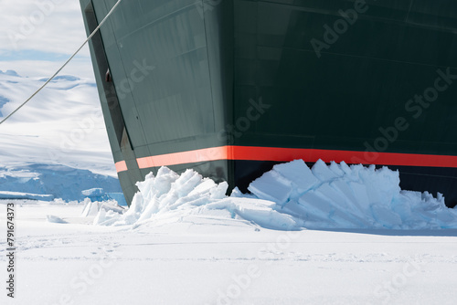 Winter cruise vacation concept. Cruise ship breaking through the ice. © Nancy Pauwels