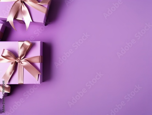 Gift boxes with ribbon on violet background  flat lay  banner with copy space for photo text or product  blank empty copyspace