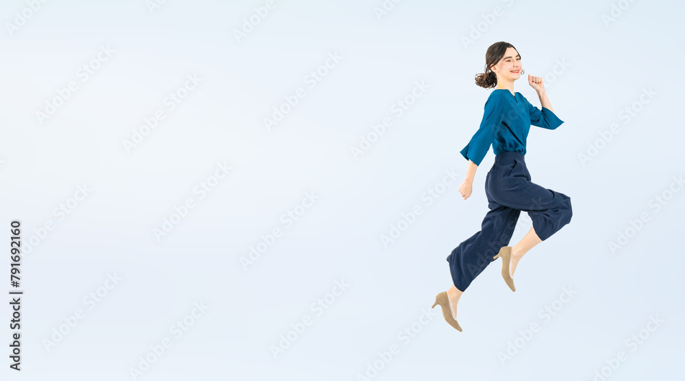 Full body photo of a Caucasian female business person jumping. (We also sell PNGs that are cropped and have transparent background. Please search for 