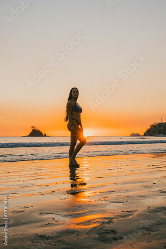 Serene Sunset Silhouette on Costa Rican Beach photo