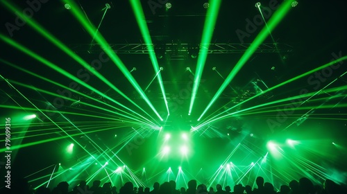 a crowd of people with green lights