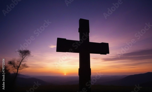 Capture the dawning light of Easter morning. A solitary cross stands silhouetted against the vibrant sunrise atop a rolling green hill. In the distance, a small village awakens, celebratin