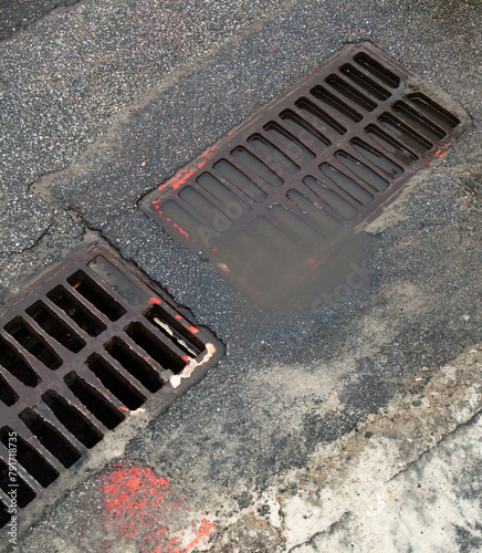 Drain grates on the road. photo