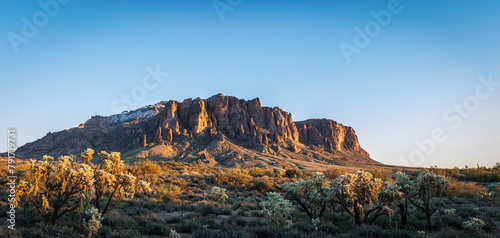 Evening panorama of the Superstition Mountains in Arizona and clear blue sky.