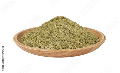 pile of dry yerba mate tea in wood bowl isolated on white background. 