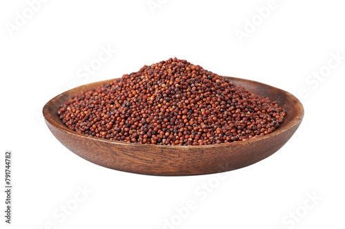 pile of red finger millet or ragi raagi nachni isolated on white background in wood bowl