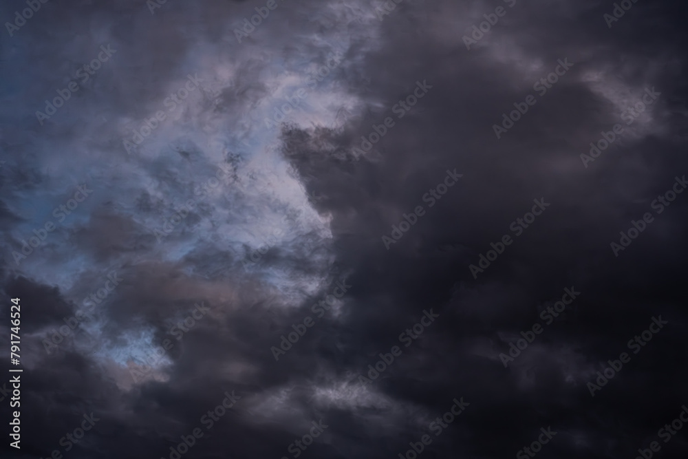 The sky is dark and cloudy, with a storm brewing in the distance