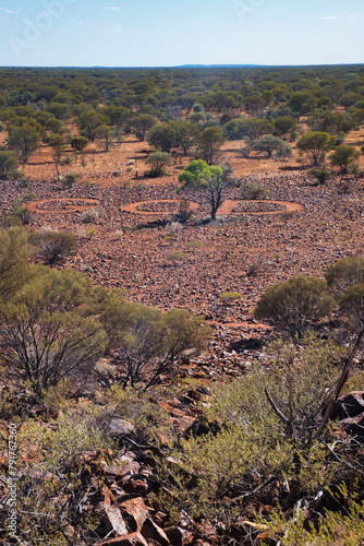 The name of God written in huge letters on a rocky plain in the Western Australian outback. Christian religious concept in a very remote place in the desert. Land art in Karalundi. 
 photo