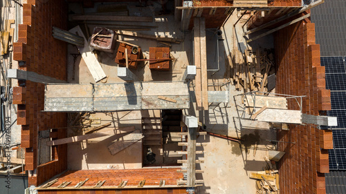 Aerial zenithal view of a house under construction. Construction site. photo