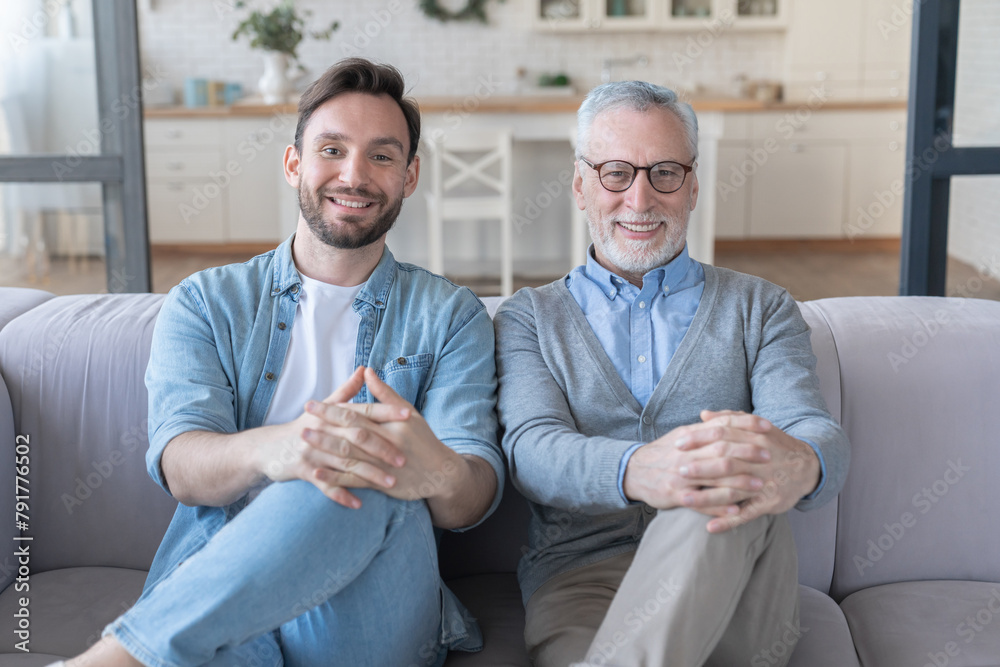 Same Father Like father, like son. Similar, as like as two peas. Adult son and ...