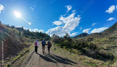 people hiking in the mountains