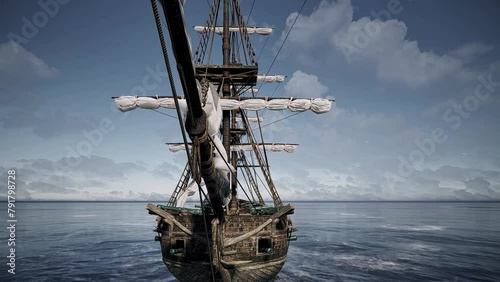 An aerial view over the top deck of an old abandoned galleon ship at sea.