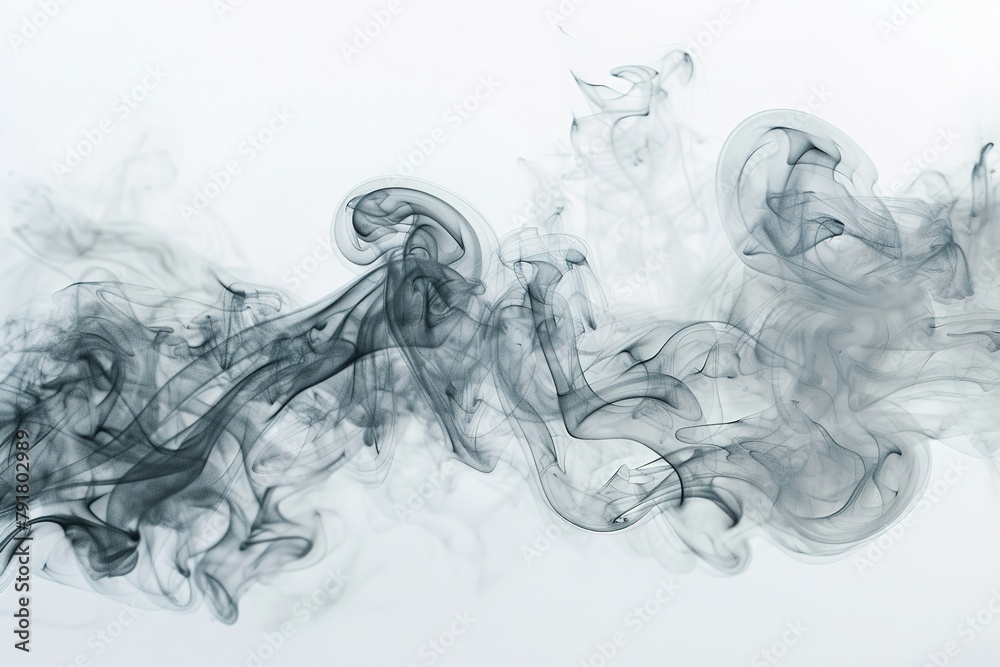 Fototapeta premium Elegant gray smoke swirls against a white background, creating an abstract and soothing visual.