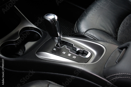 Automatic transmission shift selector in the car interior. Modern Automatic Transmission in Car. Gear lever close up. Automatic gearbox. photo
