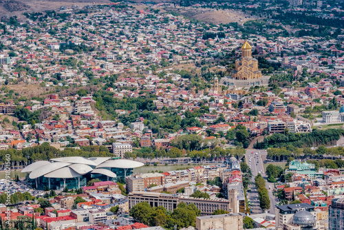 View on the capital city of Tbilisi and the Sameba cathedral from Mtatsminda park (Georgia) 