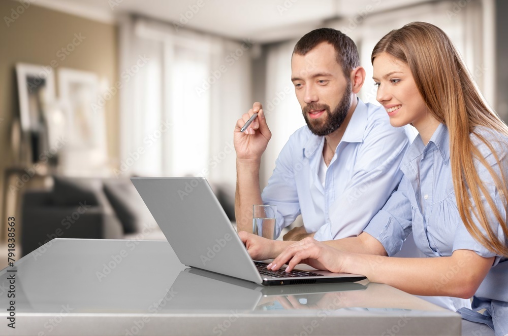 couple do financial planning with documents at home couple do financial planning with documents at home