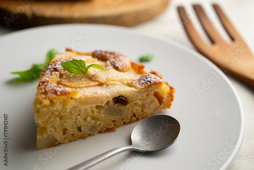 Sponge cake with pear and yogurt. Delicious traditional Italian recipe.