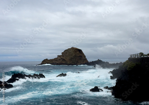 waves crashing on rocks