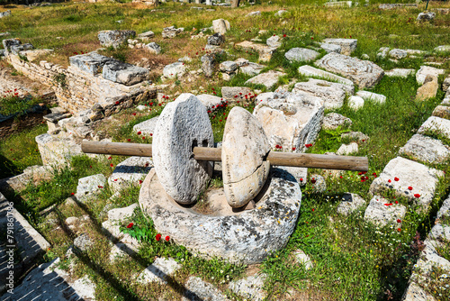 Ancient stone olive oil press in an ancient Greek archaeological site in Turkey. 