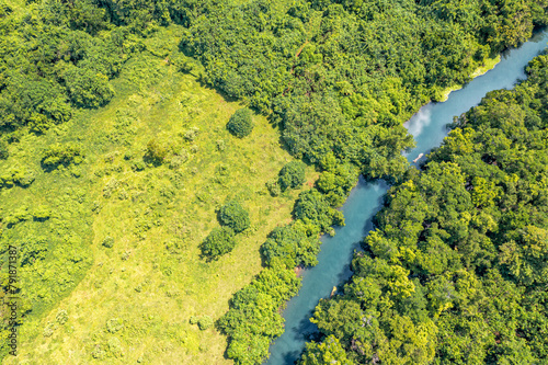 Incredible tourist landscape with a blue river in jungle forests. Top view, drone photo. Vanuatu.