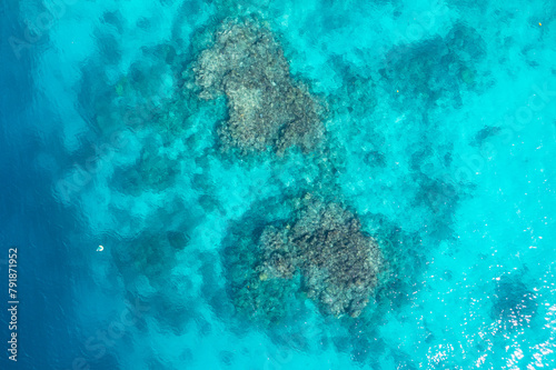 Fototapeta Naklejka Na Ścianę i Meble -  Drone top view of emerald reef in turquoise sea. Soothing ocean landscape. Sanma, Vanuatu. Tourism.
