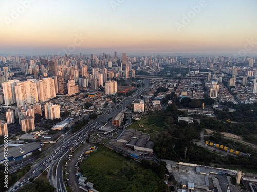 Incredible sunset in the city of São Paulo, a megalopolis with an aerial image above the Tietê River.