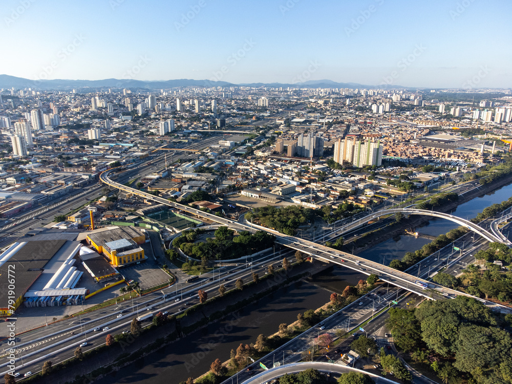 Incredible sunset in the city of São Paulo, a megalopolis with an aerial image above the Tietê River.