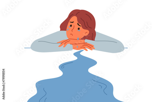Woman cries, experiencing stress and apathy after breaking up with boyfriend, lying on desk, near puddle of tears. Depressed girl cries and needs psychological support after losing position in company