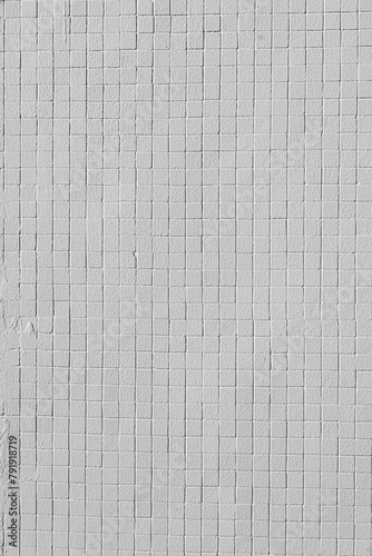 White square tiles on the wall. Perfect for background. © michaldziedziak
