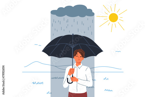 Failure and misfire haunt man standing with umbrella in rain, located in sunny area. Failure negatively affect mood of guy in business clothes, upset due to lack of luck and fortune.