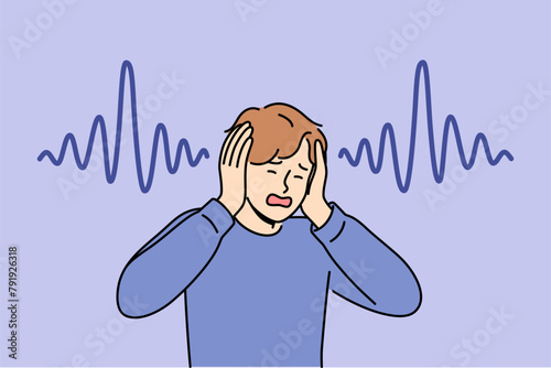 Man who has lost hearing clasps hands and screams, experiencing panic due to symptoms of terrible disease. Guy with good hearing suffers from loud music and noise, feels headache and migraine