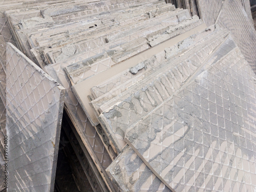 Dismantled tiles from old porcelain stoneware flooring