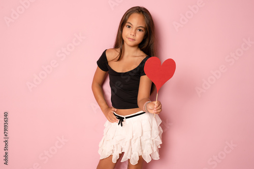 Tablou pe pânză Portrait of charming sweet young kid girl wear elegant party clothing holding re