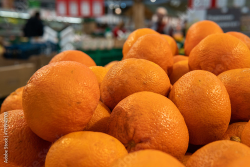A lot of oranges are sold in the supermarket