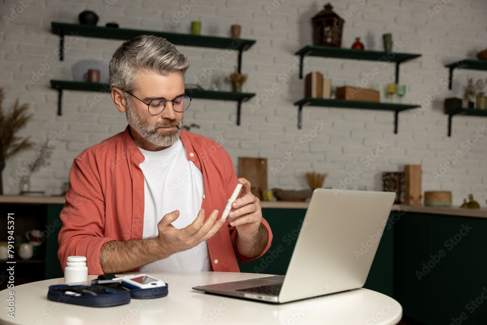 Diabetic man talking with doctor online in telehealth telemedicine video call on laptop Diabetic man talking with doctor online in telehealth telemedicine video call on laptop