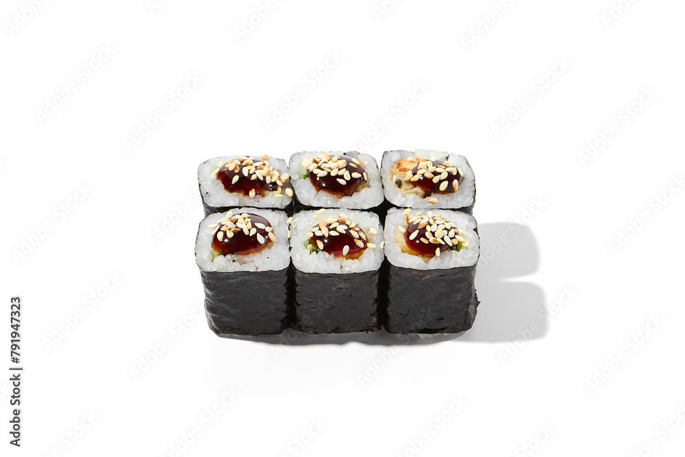 Classic japanese sushi roll with eel and unagi sauce isolated on white background. Unagi maki in minimal style with shadows. Simple maki roll on white. Maki sushi with smoked eel and sesame seeds. Classic japanese sushi roll with eel and unagi sauce isolated on white background. Unagi maki in minimal style with shadows. Simple maki roll on white. Maki sushi with smoked eel and sesame seeds.