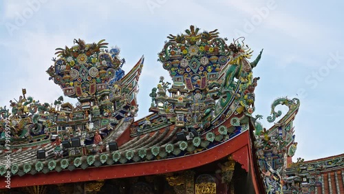 Elaborate and highly detailed roof architecture statues on the Leong San Tong Khoo Kongsi temple and clanhouse in George Town, Penang, Malaysia