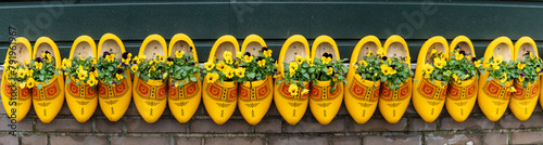 traditionally decorated yellow clogs, Zaanse Schans, Zaanstad Municipality, European Route of Industrial Heritage, Netherlands photo