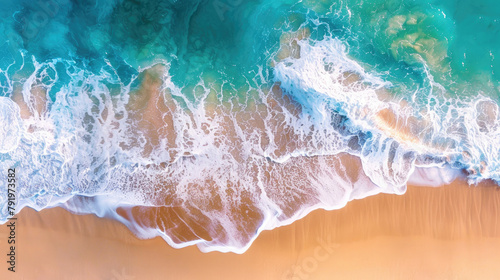 Aerial view of the blue sea wave, meeting yellow sand, beautiful seashore. © Liliya Trott