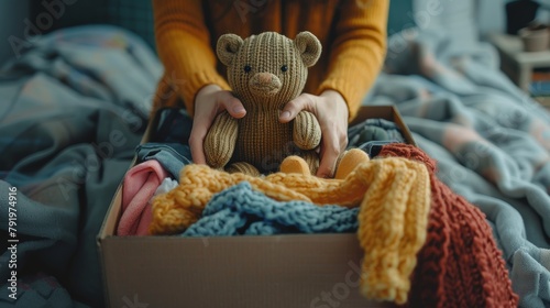 Woman Organizing Donation Box with Clothes and Toys for Charity Generative AI © Alex