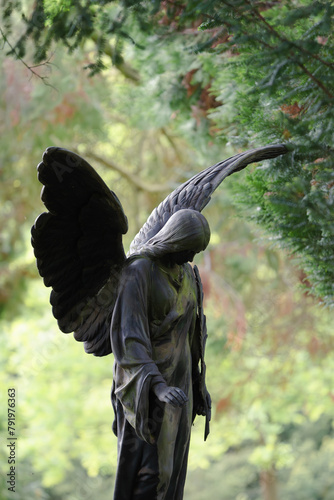 Downwards looking angel on the cemetery