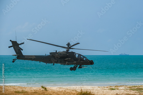 The Boeing AH-64 Apache is an American twin-turboshaft attack helicopter photo