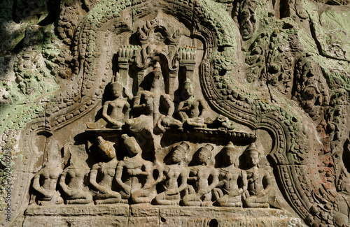 A bas-relief over an entrance at Ta Prohm temple in Siem Reap, Cambodia