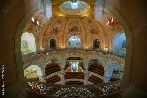 The interior of the Frauenkirche church seen through a window