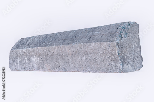 Old curb stone isolate on a white background.