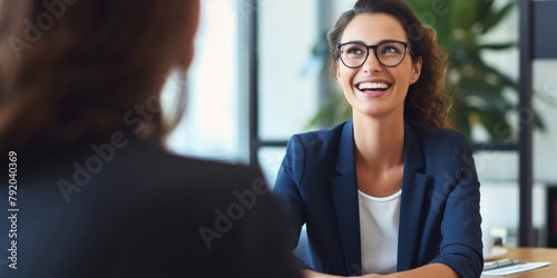 Businesswoman taking interview of a job applicant. Generative AI.